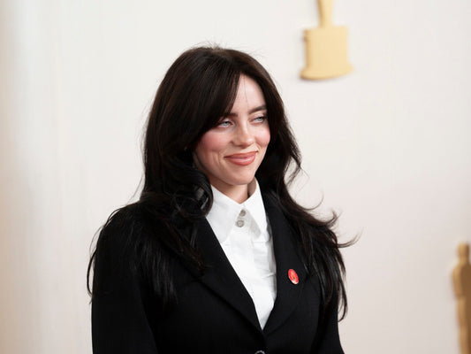 Billie Eilish Turns Heads With Bikini Pic and Rarely-Seen Tattoo